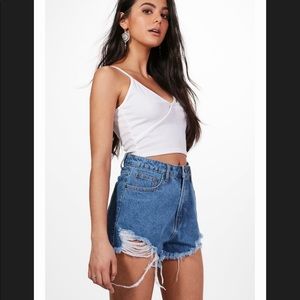 Blue Boohoo angled distressed denim shorts 6 NEW